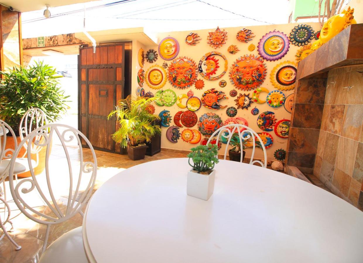 Papagayo Hotel Boutique Playa del Carmen Dış mekan fotoğraf A patio in the center of the house