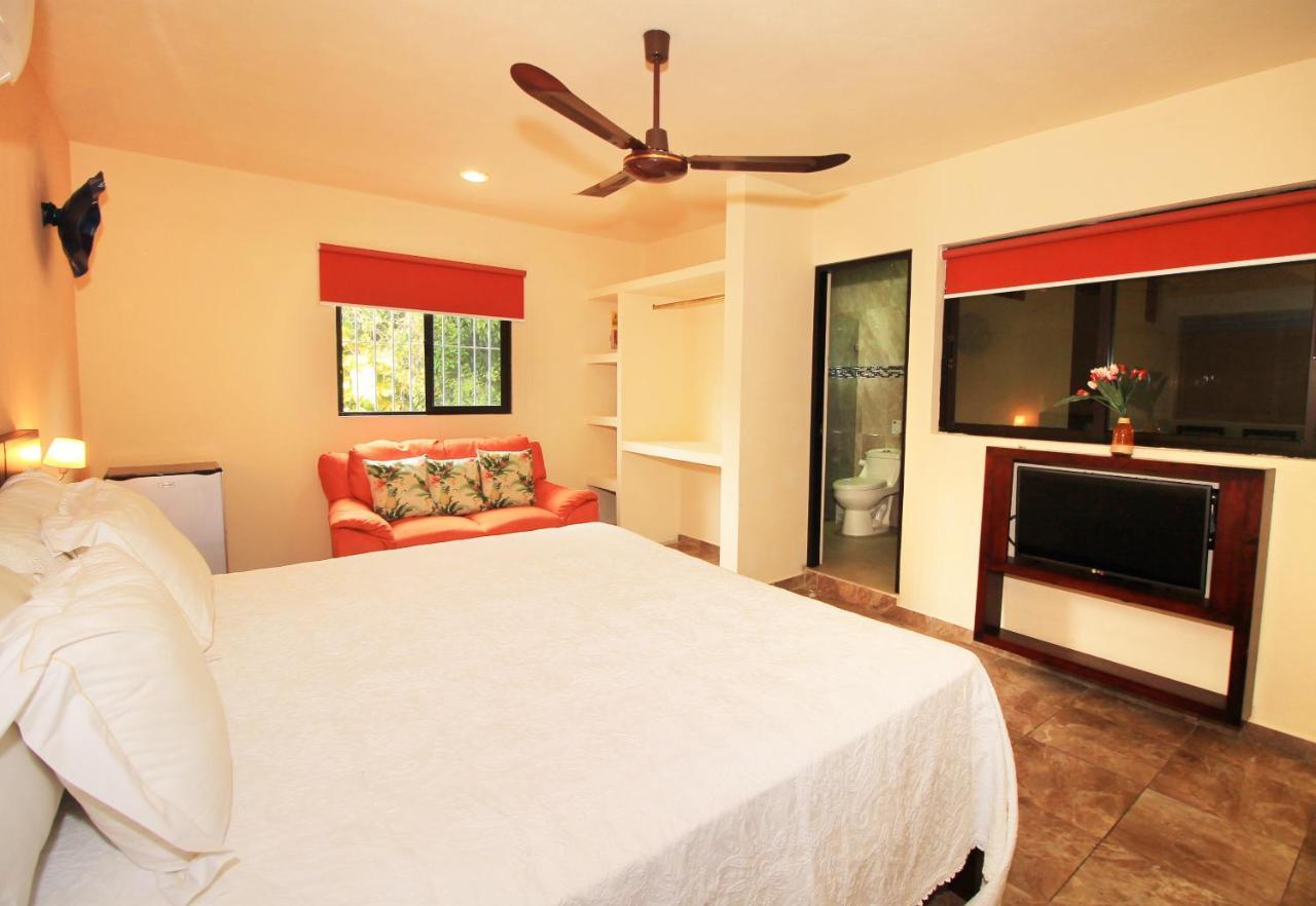 Papagayo Hotel Boutique Playa del Carmen Dış mekan fotoğraf A bedroom at the hotel