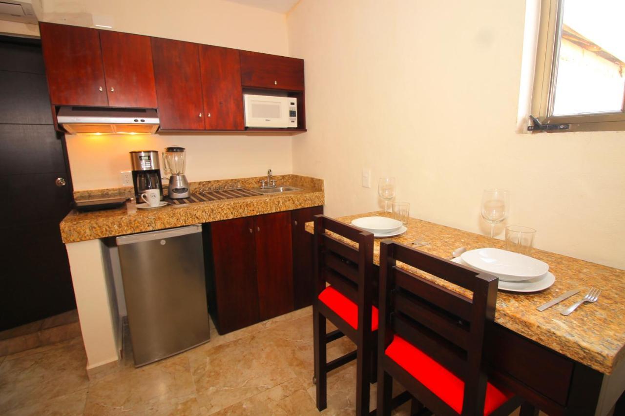 Papagayo Hotel Boutique Playa del Carmen Dış mekan fotoğraf A small kitchen