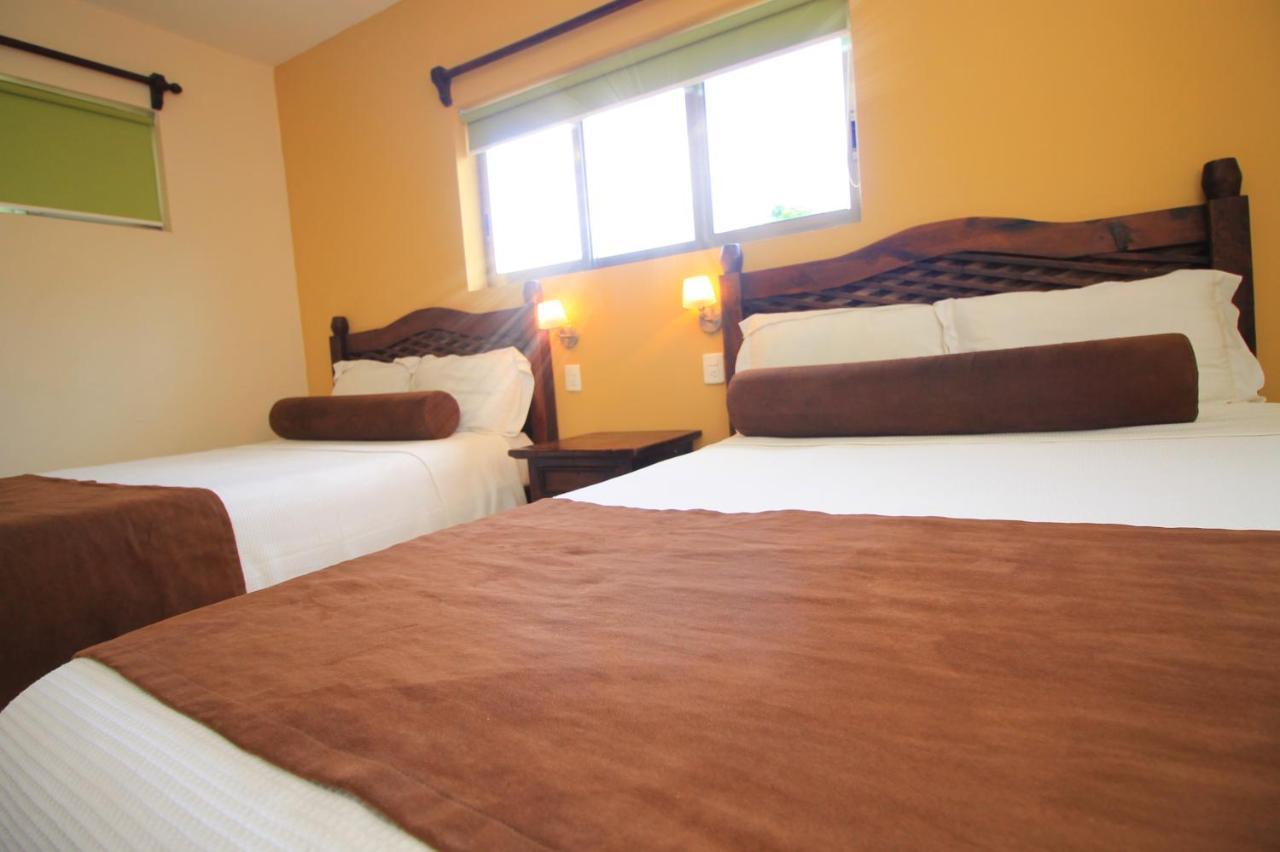 Papagayo Hotel Boutique Playa del Carmen Dış mekan fotoğraf A room at the hotel