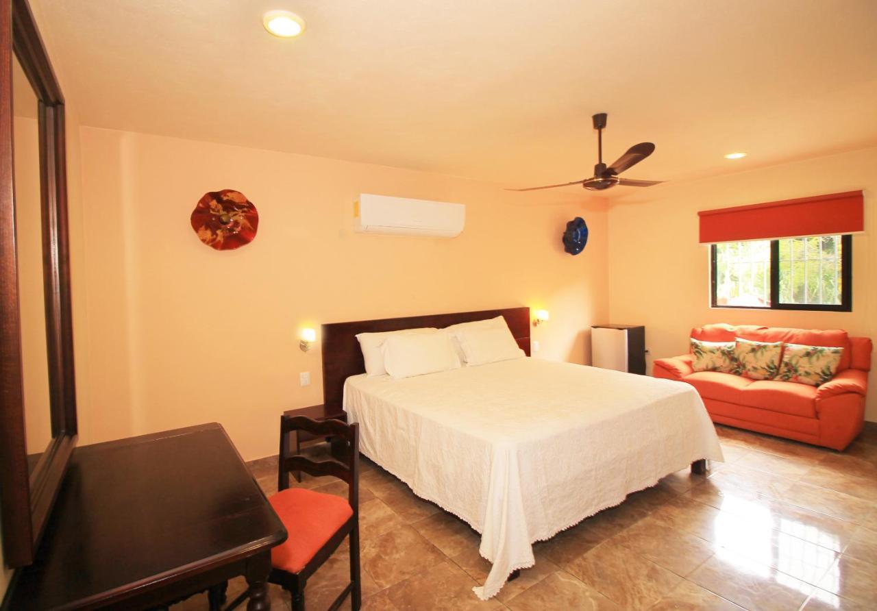 Papagayo Hotel Boutique Playa del Carmen Dış mekan fotoğraf A bedroom at the hotel